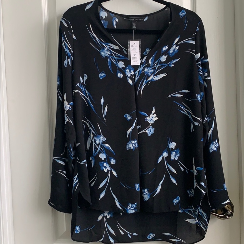 Black V neck pleated blouse.